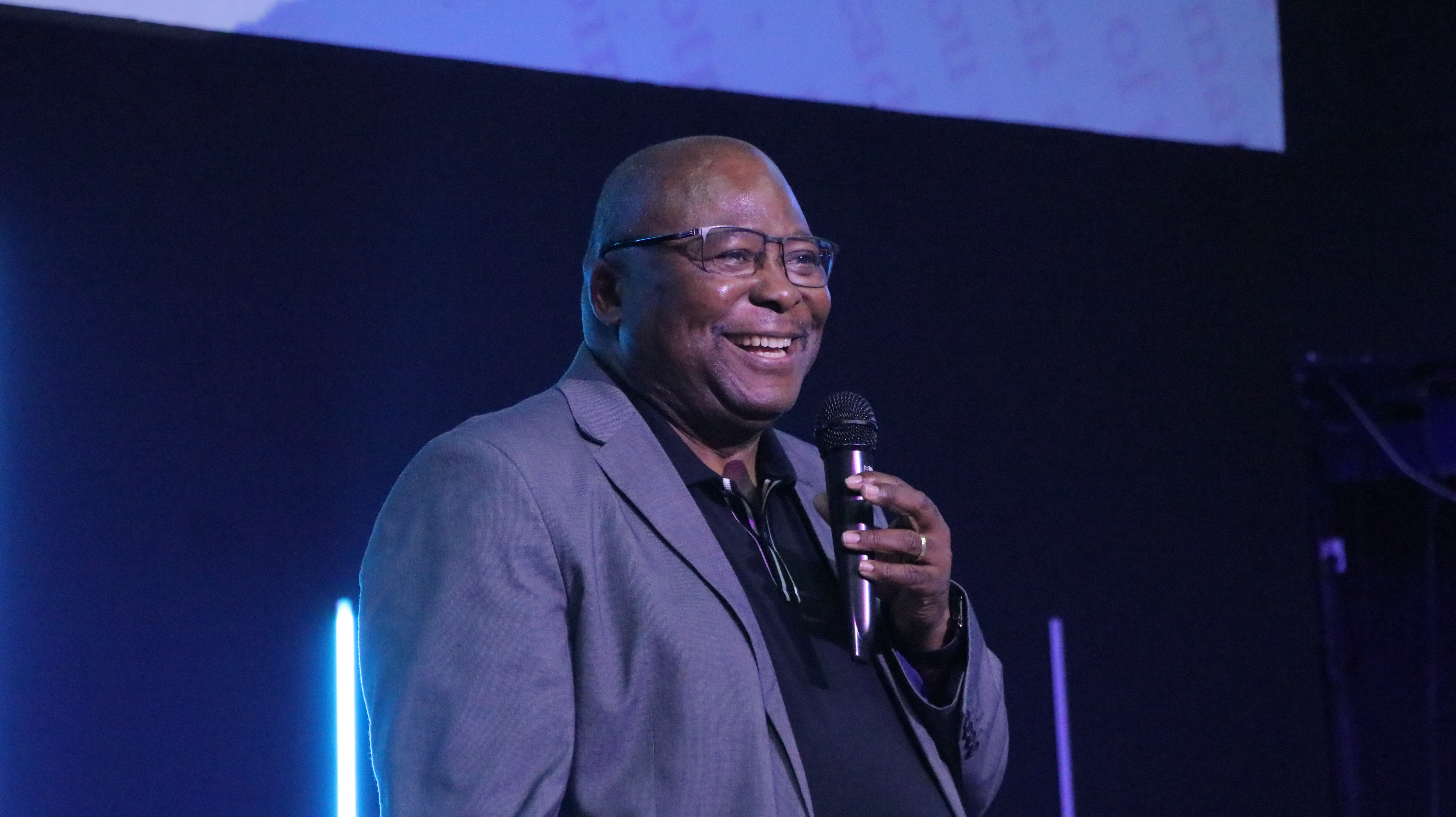 Dr. Elijah Mahlangu speaking during a Cornerstone Church service